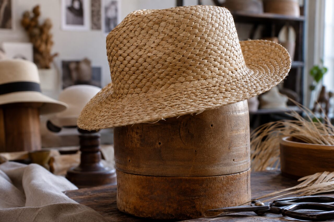 Atelier de modiste indépendant — a close view of woven hat texture
