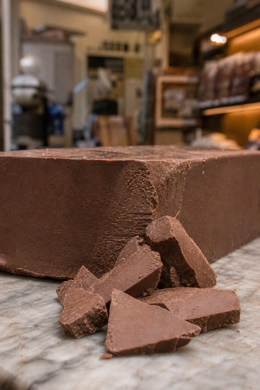 Broken chocolate block in a chocolate workshop