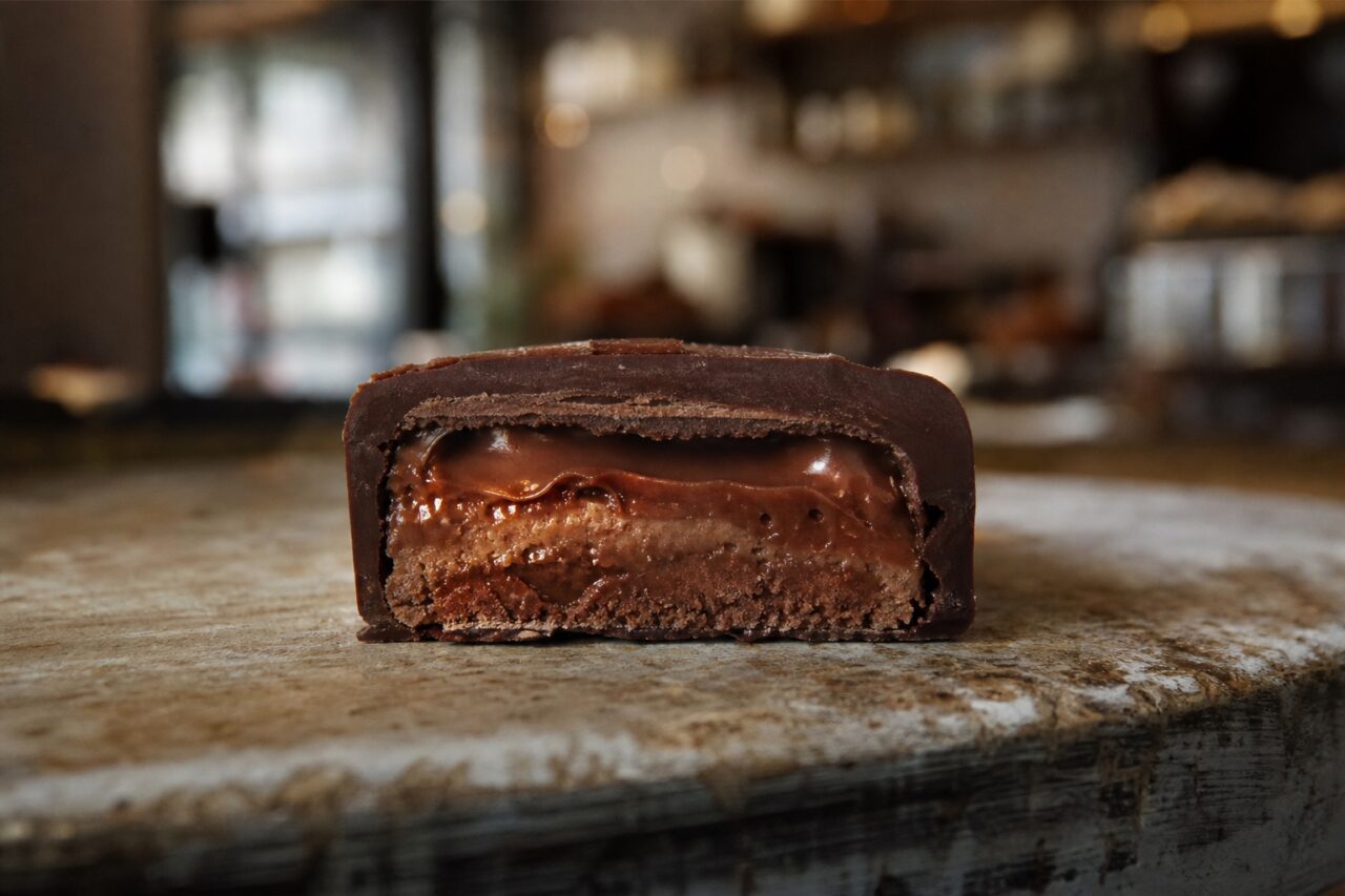 Cut praline bonbon showing its soft center