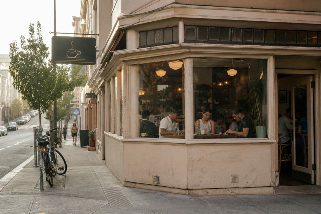 Café d’angle vitré avec enseigne à tasse