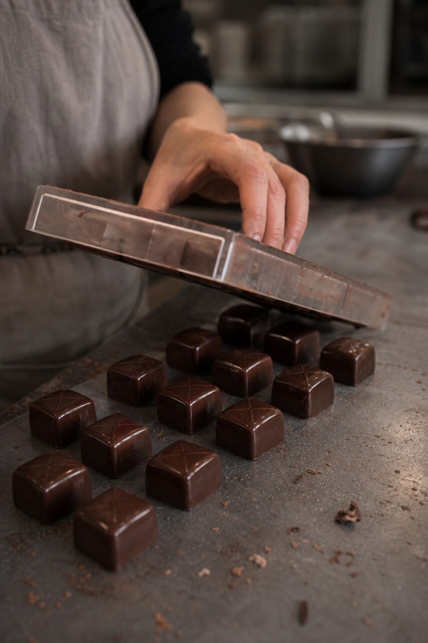 Demolding square chocolates in Cape Town