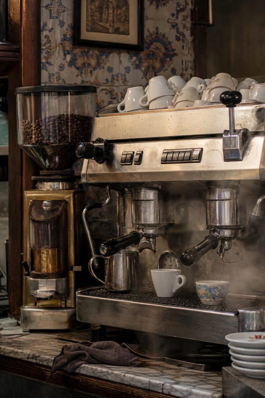 Large espresso machine, grinder and stacked cups