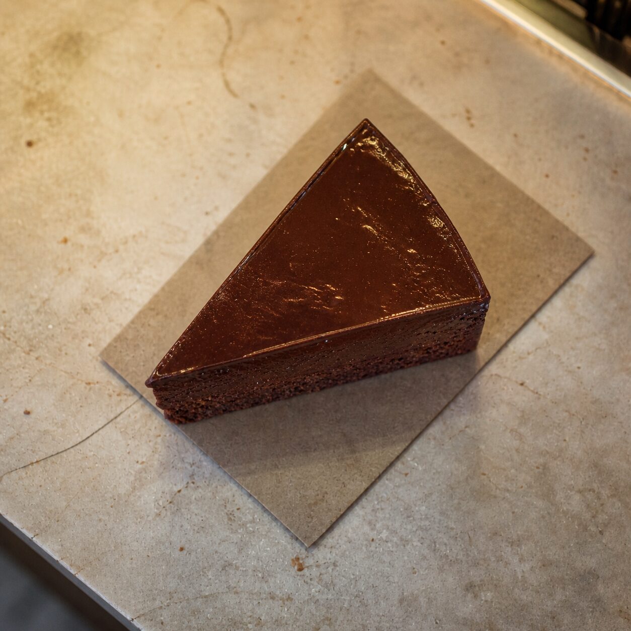 Sacher cake slice viewed from above