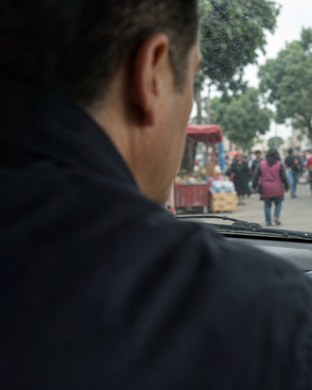 Close portrait of a person in front of the windscreen