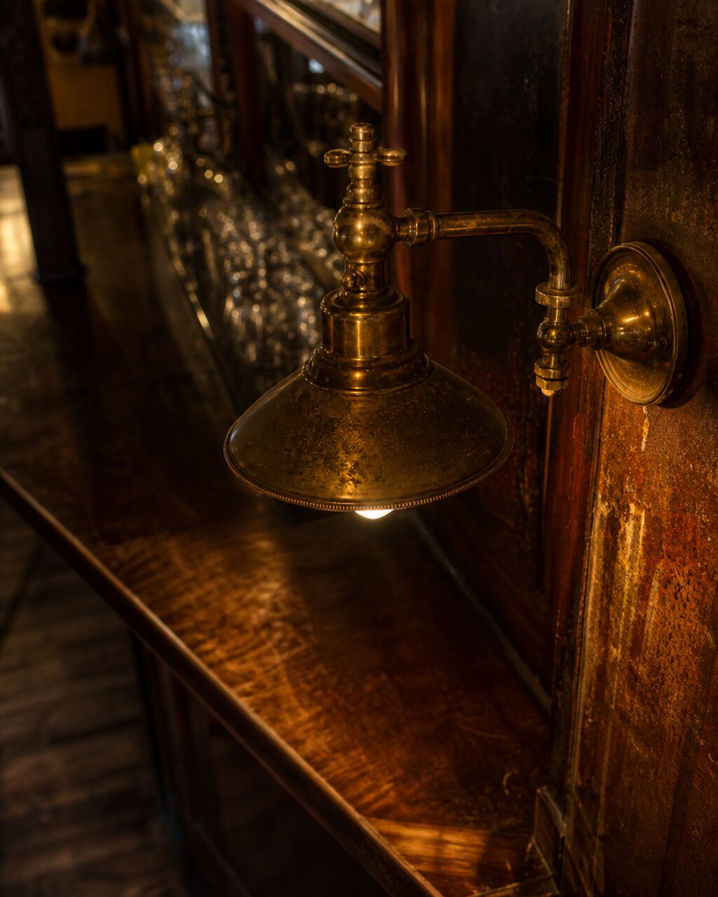 High-angle view of the wall lamp and worn counter